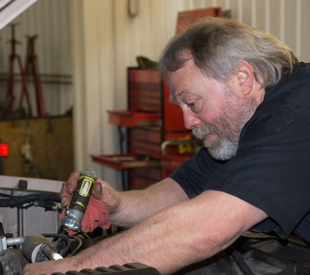 A technician at Southside Tire & Auto inspect and diagnose engine issues.
